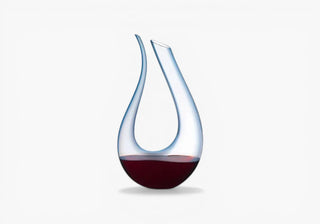 Explore sculptural crystal decanters designed to enhance aeration and elevate wine presentation with iconic flowing design. ShopDecor®: limited stock.