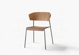 Discover refined Lisa chairs, armchairs & stools by Marcello Ziliani, blending upholstery, wood and steel for elegant contract interiors. Shop the look on ShopDecor®