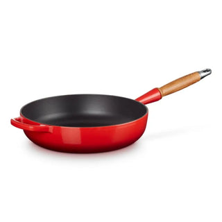 Le Creuset Signature cast iron classic sauté pan with wooden handle diam. 28 cm. Le Creuset Cerise - Buy now on ShopDecor - Discover the best products by LE CREUSET design