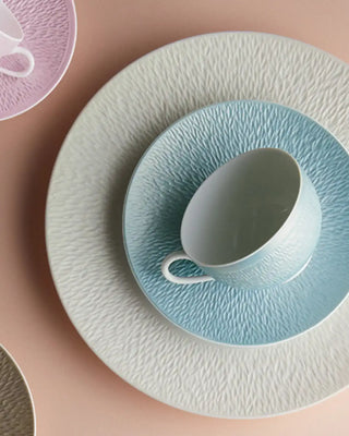 Raynaud Minéral tea cup with saucer in Limoges porcelain with coloured decoration