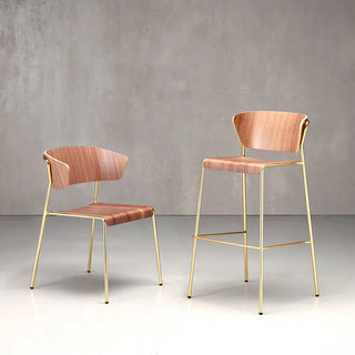 Scab Lisa Wood 2850 armchair with wooden shell and steel legs
