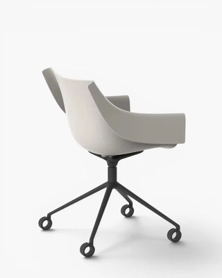 Vondom Manta swivel caster armchair with polypropylene shell and powder-coated metal four-star base