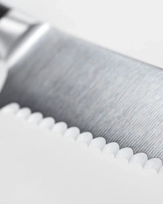 Wusthof Ikon serrated utility knife 14 cm - 5 in - african black wood - Buy now on ShopDecor - Discover the best products by WÜSTHOF design