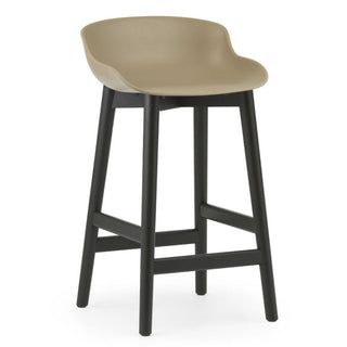 Normann Copenhagen Hyg black oak bar stool with polypropylene seat h. 65 cm. - Buy now on ShopDecor - Discover the best products by NORMANN COPENHAGEN design