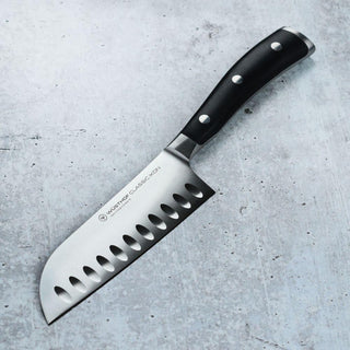 Wusthof Classic Ikon santoku knife with hollow edge 14 cm. black - Buy now on ShopDecor - Discover the best products by WÜSTHOF design